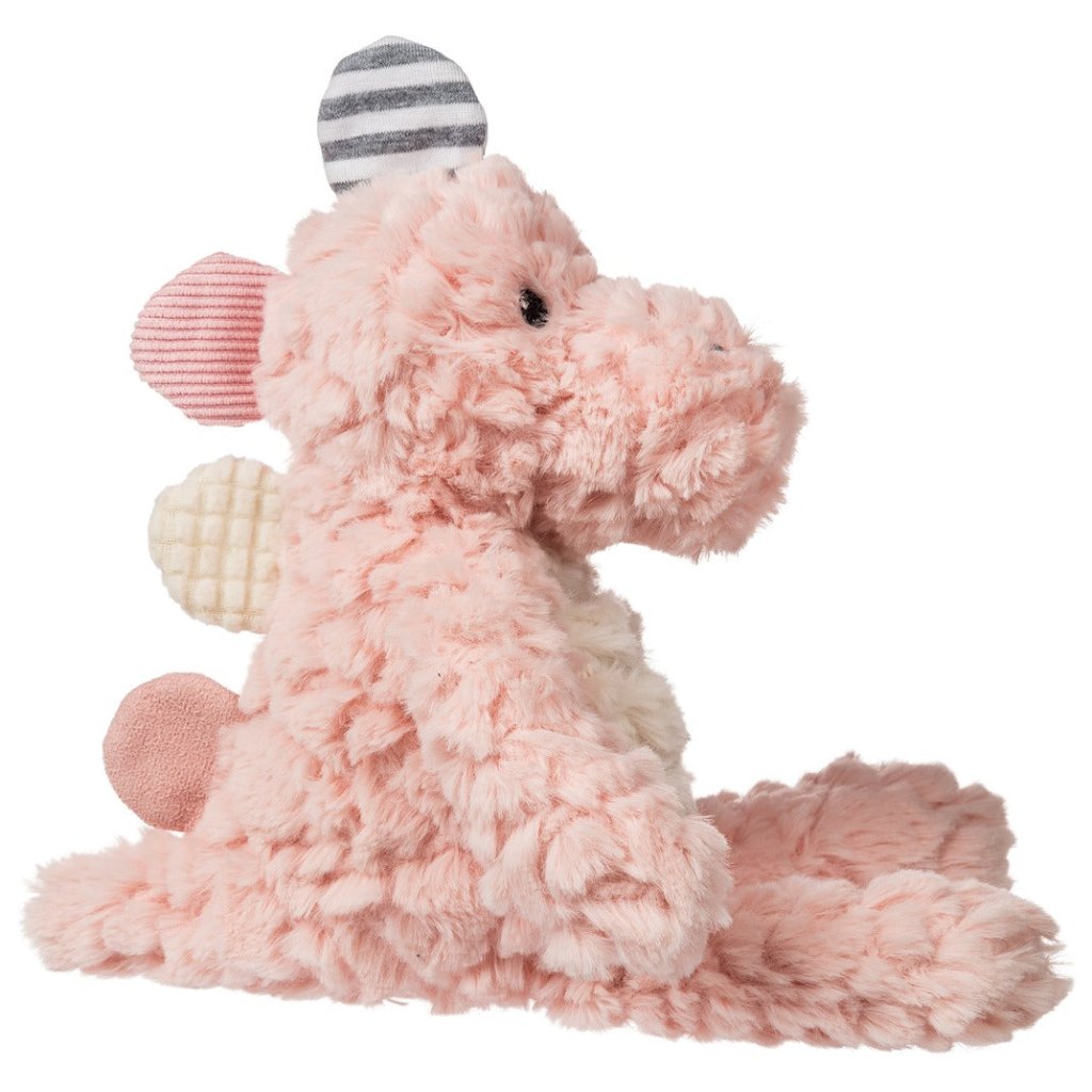 Pink stegosaurus soft toy with taggies