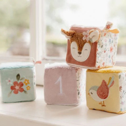 soft pastel blocks with deer, bird and flower design