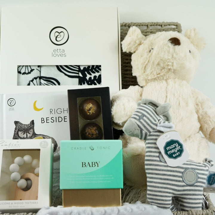 mum and baby sensory hamper , sensory book, 3 muslins in black and white, cream teddy, striped zebra soft ratte, sensory candle,