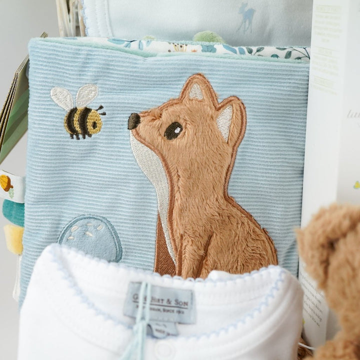 baby boy luxury baby hamper wioth luxury white clothing set, little dutch soft blocks with forest animals, little duct soft book with forest animals, organic baby bath, soft steiff teddy bear, baby white cute slippers