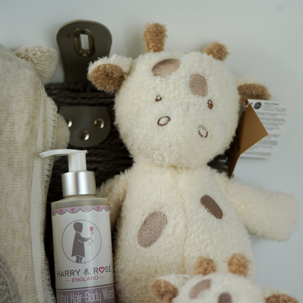 NEUTRAL BABY HAMPER, BABY BLANKET WITH HEARTS AND POMPOMS, BABY WASH, NATTOU GIRAFFE , GRAFFE RATTLE, BABY BOOTIES