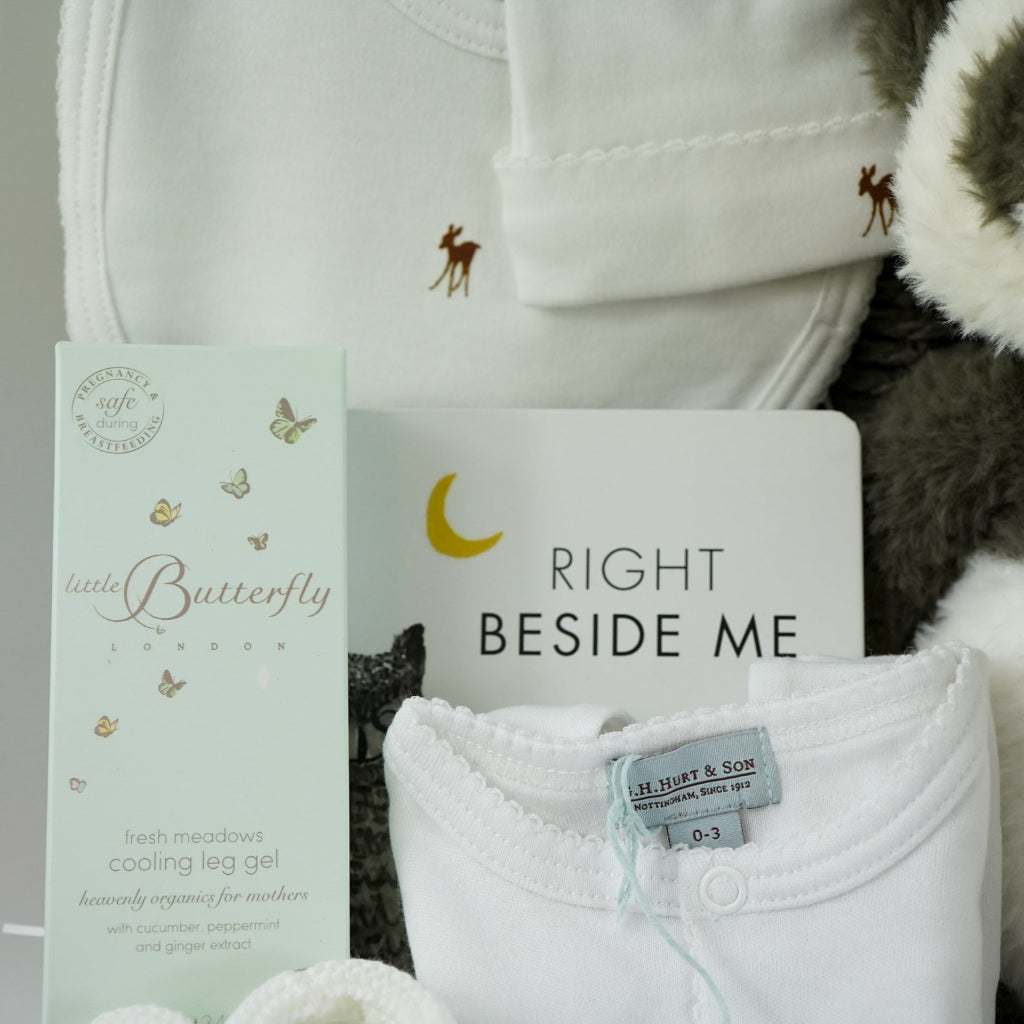 mum and baby gift hamper, baby luxury layette set, black and white baby book, black and white panda, Little butterfly london mummy toiletries, knit booties