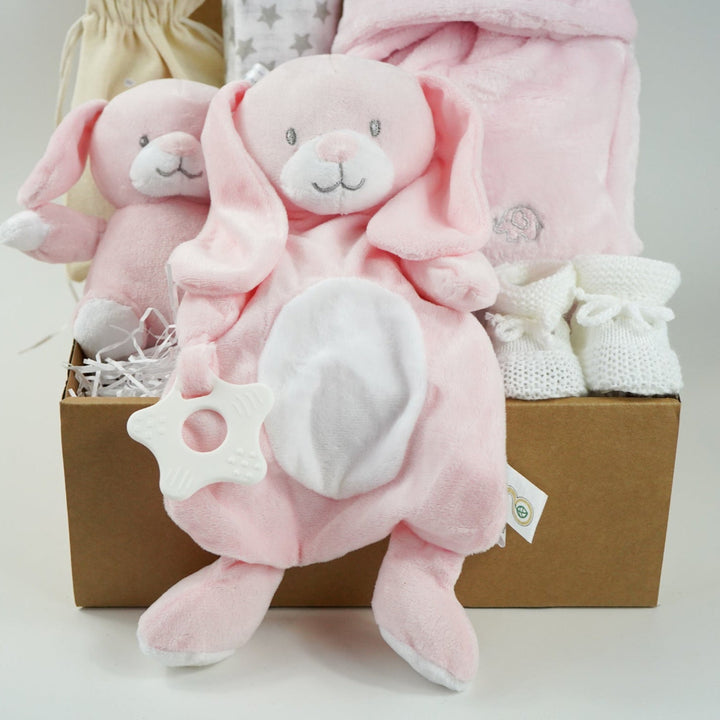 Baby hamper box includes pink bunny comforter and bunny soft toy, pink dressing gown , milestone baby discs and baby booties