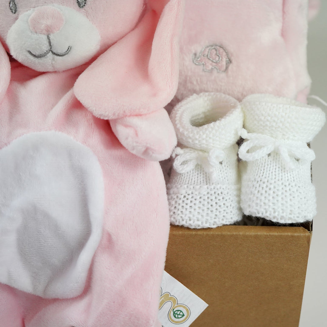 Baby hamper box includes pink bunny comforter and bunny soft toy, pink dressing gown , milestone baby discs and baby booties