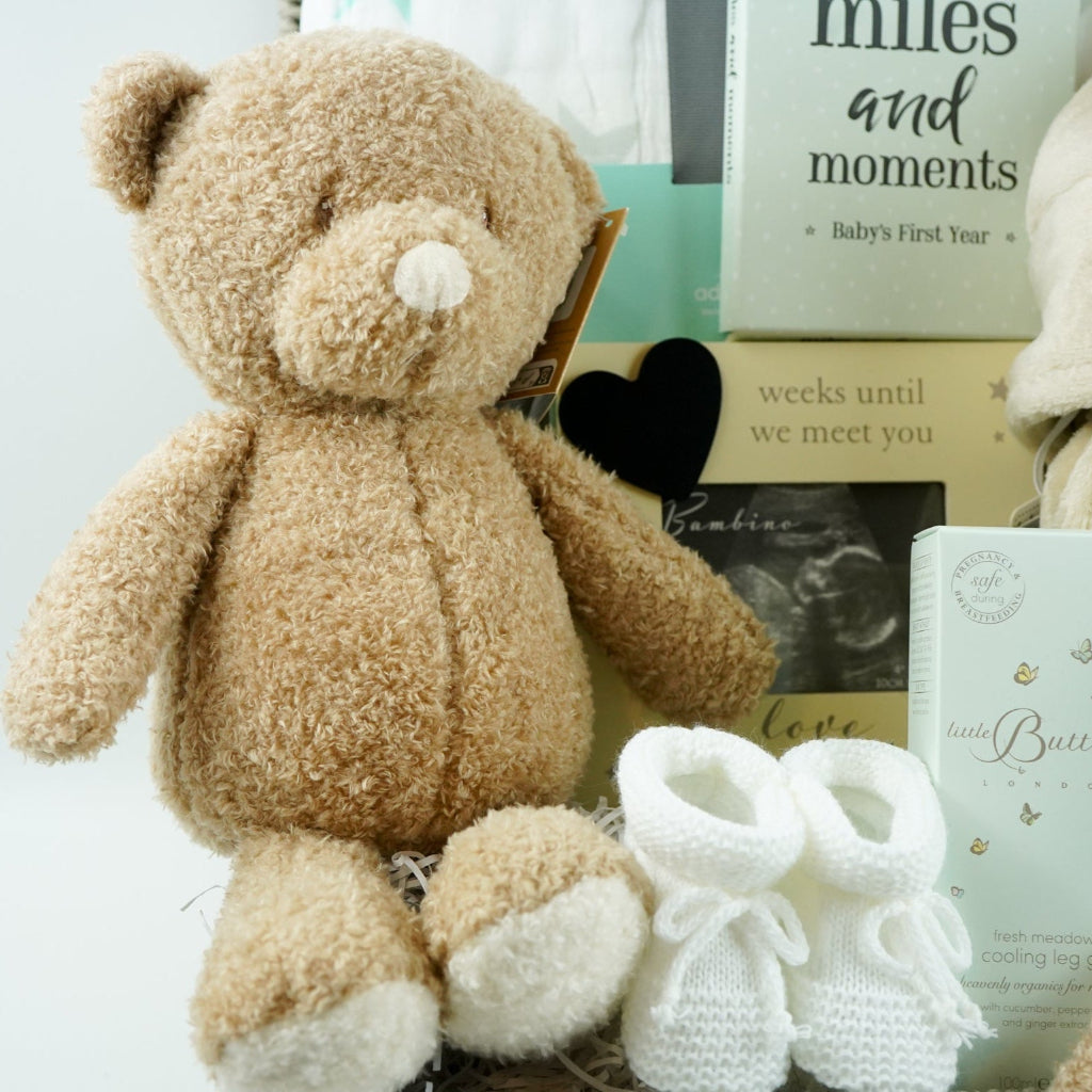 Pregnancy Teddy Bear Neutral Baby Hamper Basket, Aden & Anais Dream Baby Blanket, Baby Dressing Gown, baby scan frame, baby milestone cards m, white booties