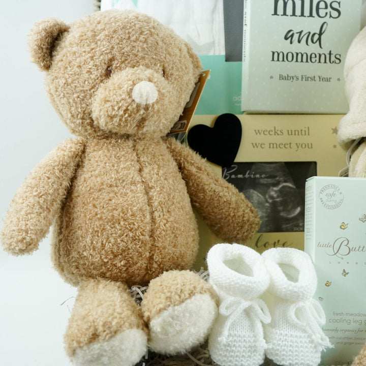 Pregnancy Teddy Bear Neutral Baby Hamper Basket, Aden & Anais Dream Baby Blanket, Baby Dressing Gown, baby scan frame, baby milestone cards m, white booties