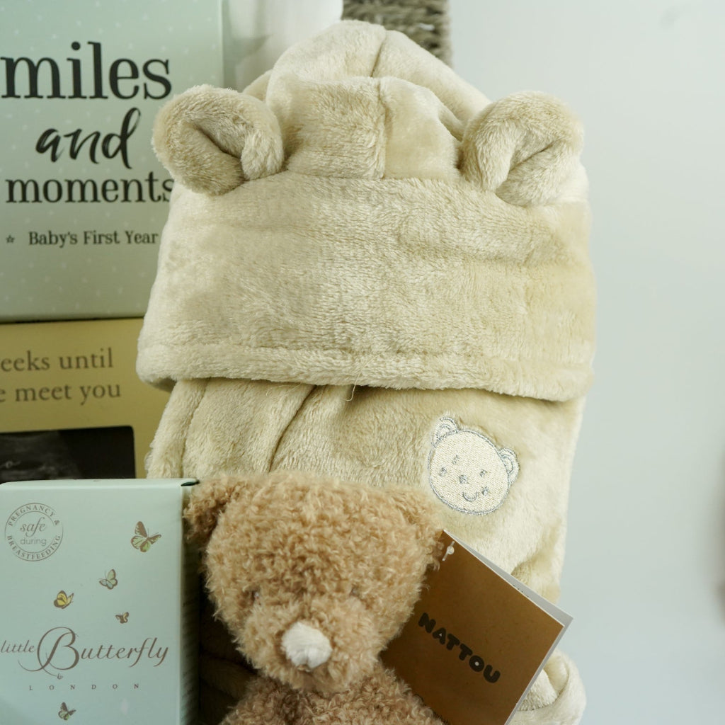 Pregnancy Teddy Bear Neutral Baby Hamper Basket, Aden & Anais Dream Baby Blanket, Baby Dressing Gown, baby scan frame, baby milestone cards m, white booties