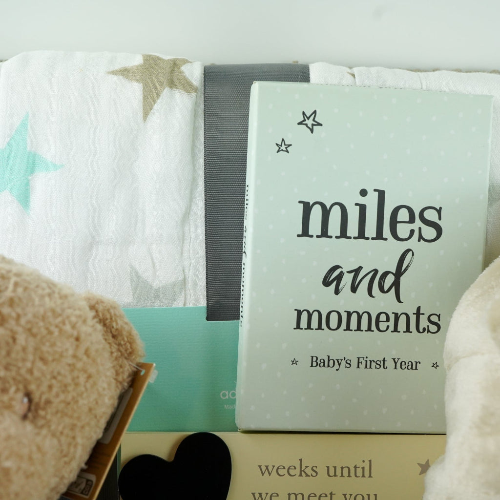 Pregnancy Teddy Bear Neutral Baby Hamper Basket, Aden & Anais Dream Baby Blanket, Baby Dressing Gown, baby scan frame, baby milestone cards m, white booties