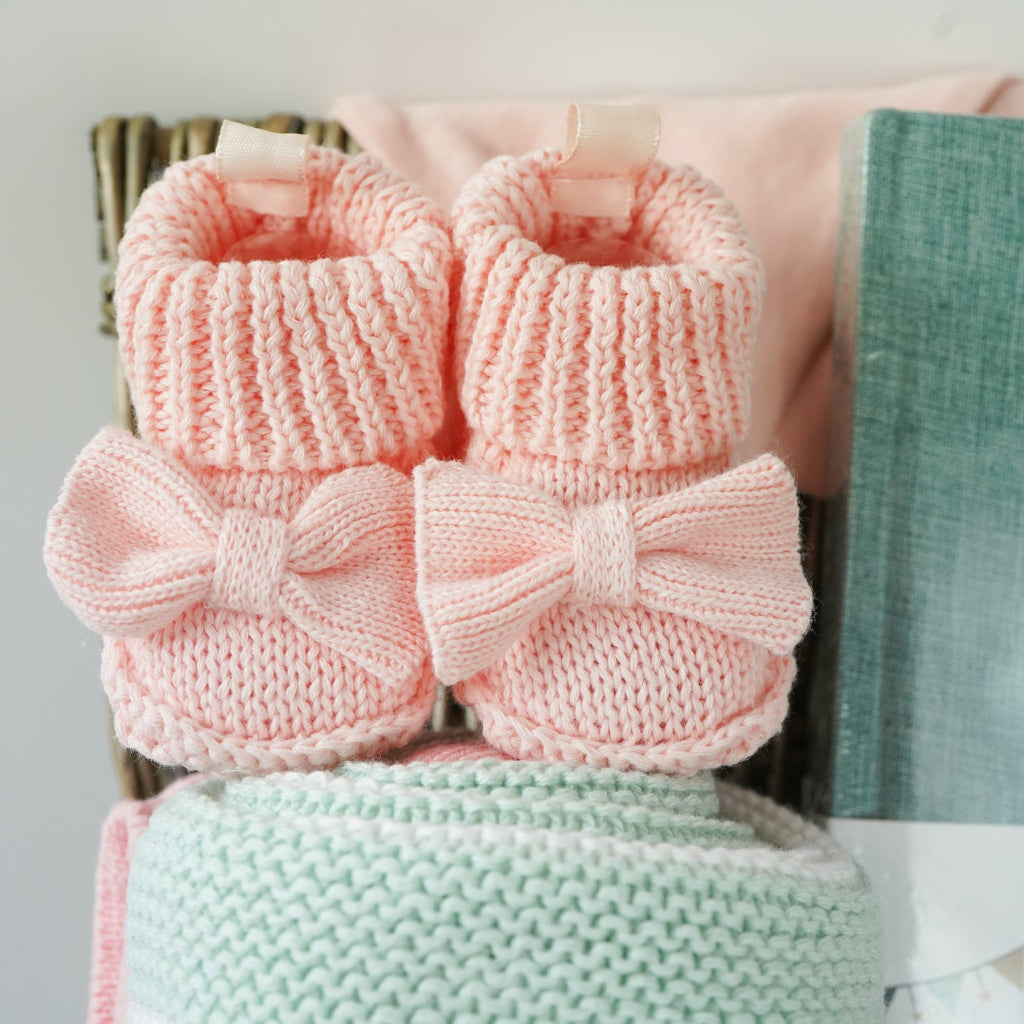 baby girl  hamper basket, pink pig baby comforter with chintz headband, pink pig soft toy with chintz headband, baby journal, organic baby toiletries, pink baby  bookies with a large bow,, Baby outfit -sleepsuit with lace chest area and matching hat in pink, soft luxury baby muslin swaddle with butterfly pattern, baby blanket in pink, white and green stripe