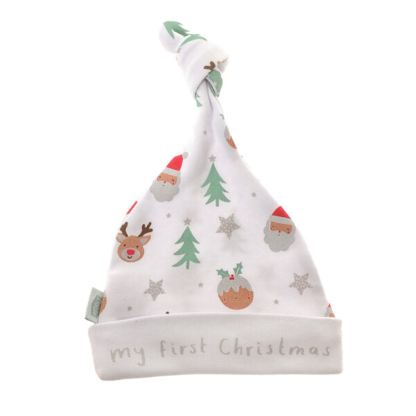 baby's white knot hat with reindeer , Christmas trees and Christmas puddings