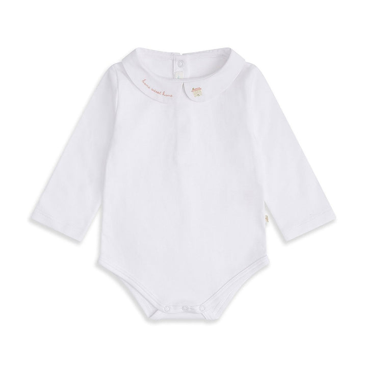 white onesie with home sweet home embroidered on one collar and a house on the other