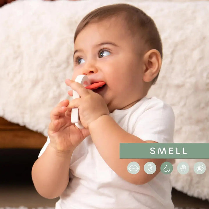 Colorful baby teether with 'Sophie la girafe' branding on a white background