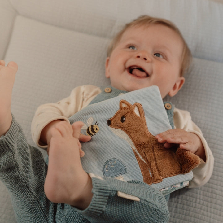 Forest friends soft baby activity book with fox  on the cover and taggies
