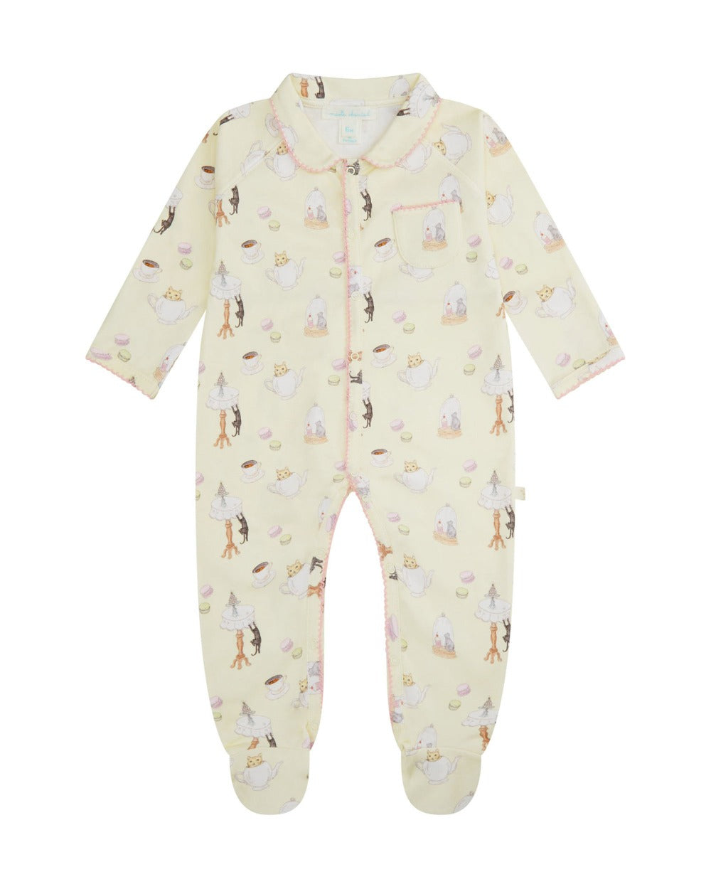 Vanilla coloured baby sleepsuit with kittens pattern