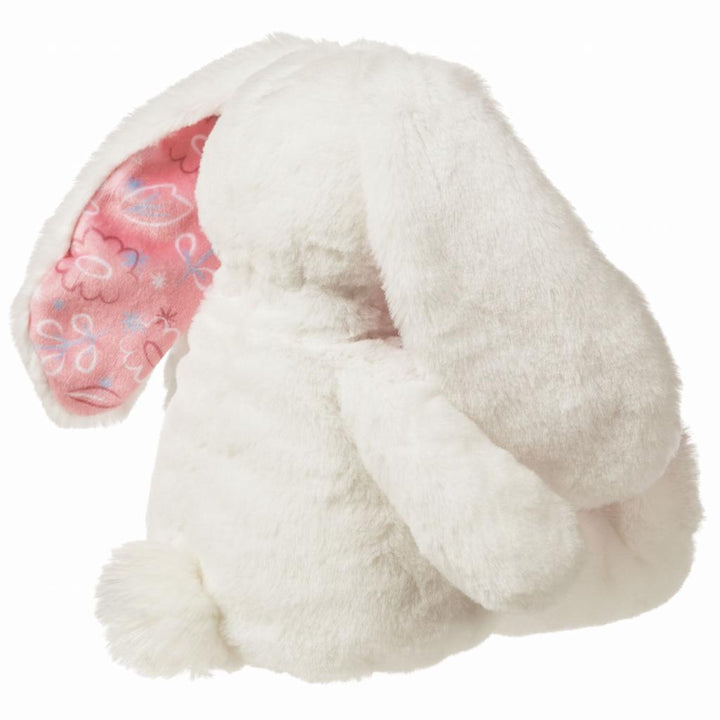 soft plush fluffy floppy bunny with pink floral inner ears and embroidered flower on foot