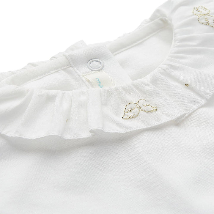 Soft dusty blue velour sleepsuit with gold angel wings by Marie- Chantal, white bodysuit with frilled collar with golf angel wing embroidery