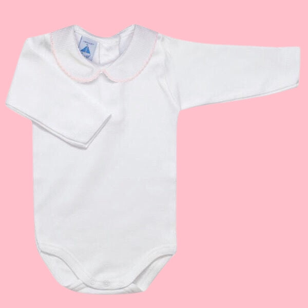 white cotton Spanish baby vest with peterpan collar iand pink trim on picot edge