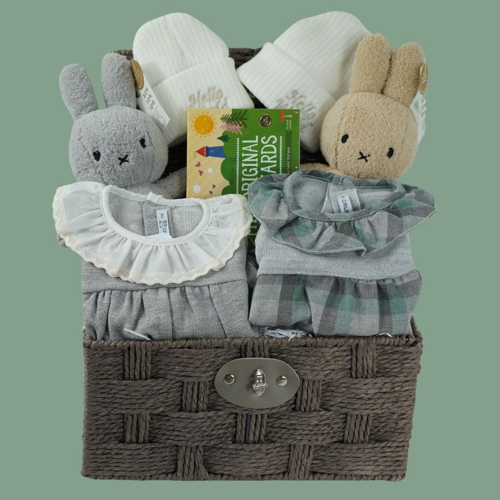 twin baby hamper  with 2 baby rompers in green and grey, white baby beanie hat, 2 x miffy one grey one biscuits colour, twins milestone cards