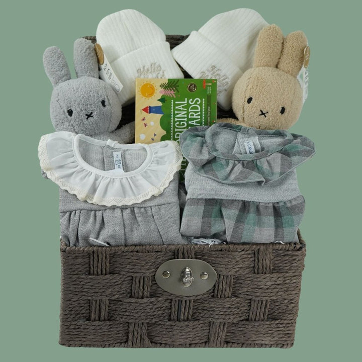 twin baby hamper  with 2 baby rompers in green and grey, white baby beanie hat, 2 x miffy one grey one biscuits colour, twins milestone cards