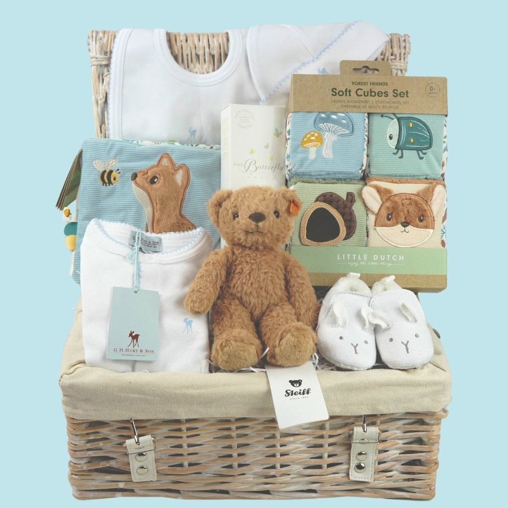 baby boy luxury baby hamper wioth luxury white clothing set, little dutch soft blocks with forest animals, little duct soft book with forest animals, organic baby bath, soft steiff teddy bear, baby white cute slippers