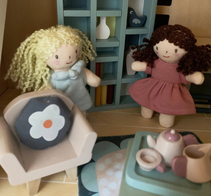 3 mini dolls in a box