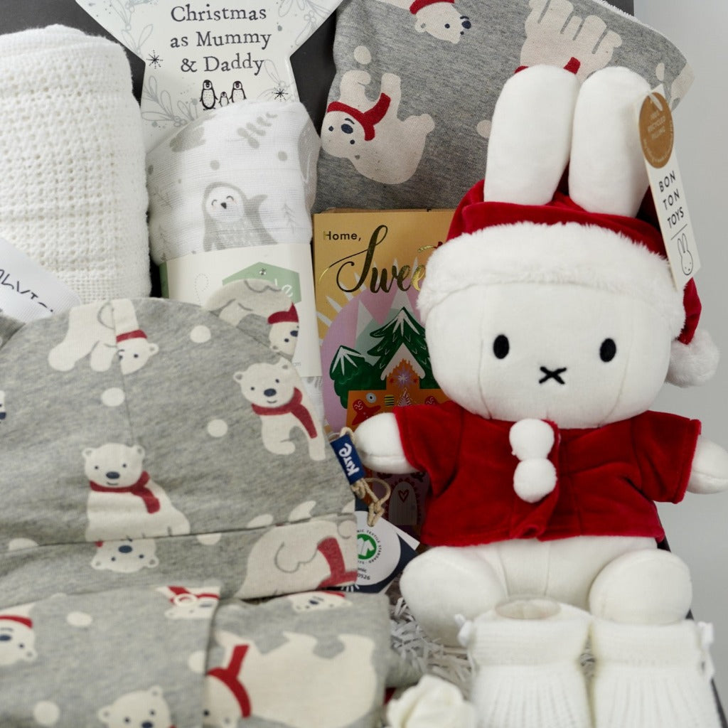 Baby christmnas hamper, grey baby organic cotton sleepsuit with polar bears, matching hat and bib with polar bears, white cotton cellular blanket, baby muslin with polar bears, Miffy Santa soft toy, Luxury chocolate