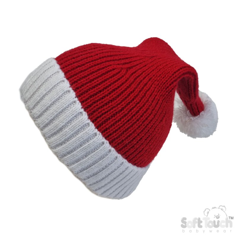 A Red and White Santa Hat with a White Pom Pom on Top Stock Photo A Red and White Santa Hat with a White Pom Pom on Top Stock Photo