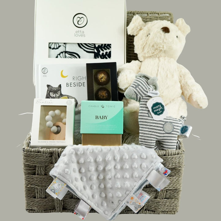 baby sensory hamper with sensory black and white muslins, candle, chocolates, sensory bookbaby taggie comforter, sensory baby book, cream teddy