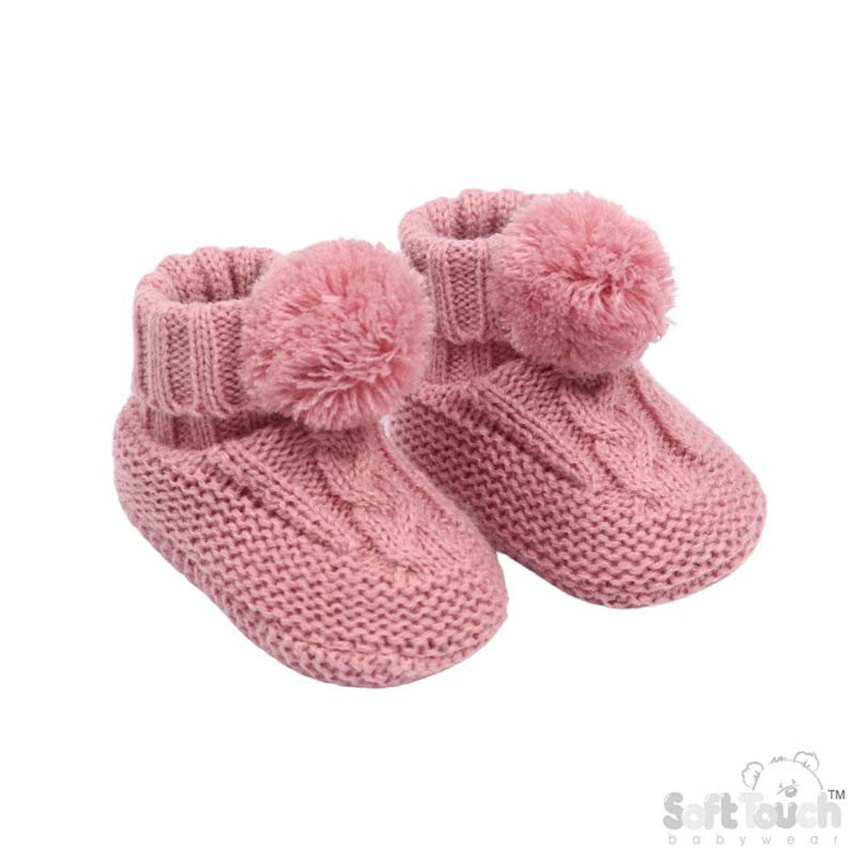 dusty pink baby bootees with cable detail and pom pom