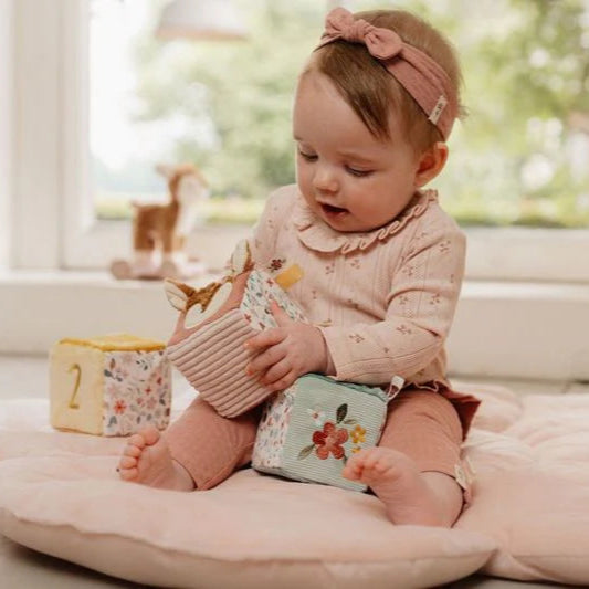 soft pastel blocks with deer, bird and flower design