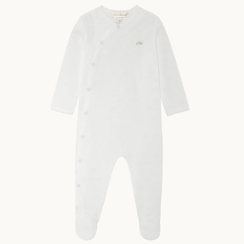 Made from 100% cotton and featuring our signature Angel Wing pointelle design, Marie-Chantal’s sleepsuit is a newborn must-have.
- Featuring our signature Angel Wing pointelle design and gold Angel Wing.
- White picot trim
- Footed design
- Snap fastenings down the front