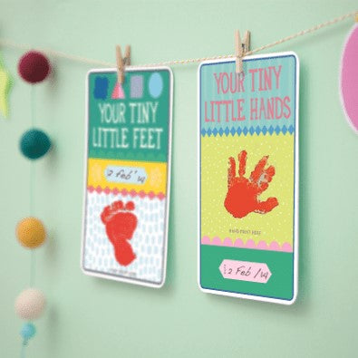 Pregnancy and newborn milestone cards in a box
