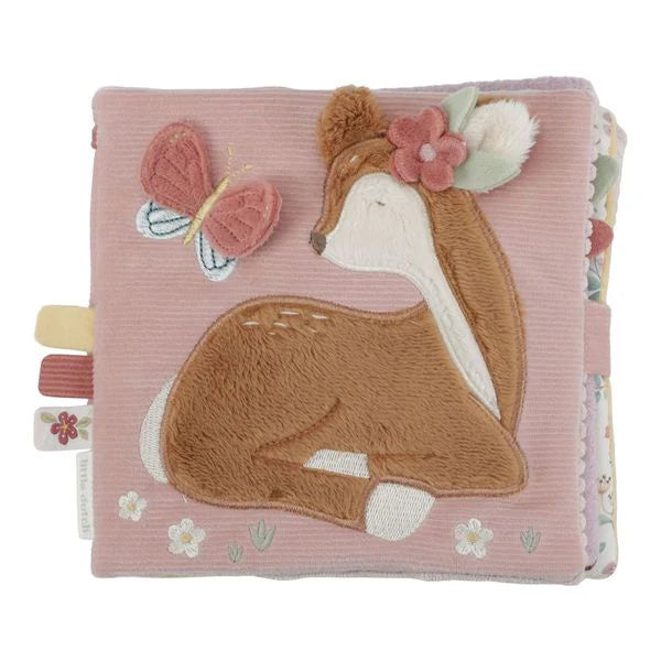 Pink soft baby sensory book with deer and fairy garden theme, full of pastel pink and green interactive images  and baby mirror