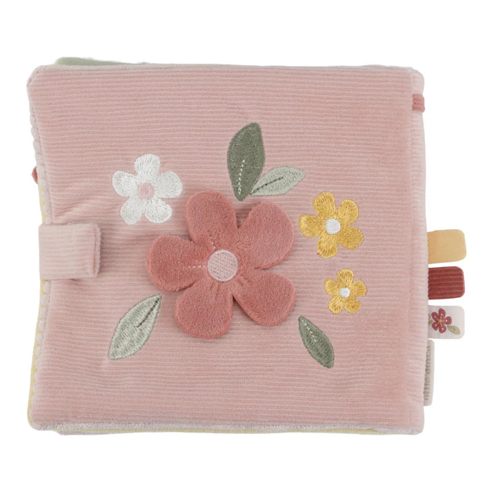 Pink soft baby sensory book with deer and fairy garden theme, full of pastel pink and green interactive images  and baby mirror