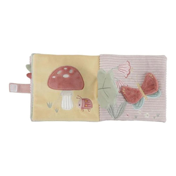 Pink soft baby sensory book with deer and fairy garden theme, full of pastel pink and green interactive images  and baby mirror
