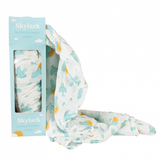 White swaddling blanket with light blue skylarks boxed