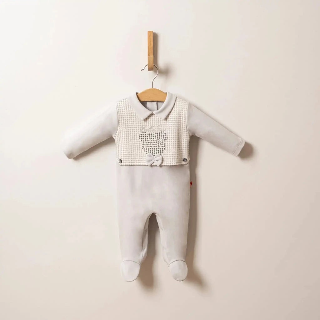 Beige spanish style baby romper with a collar and dog tooth print bib with a teddy design, bow tie