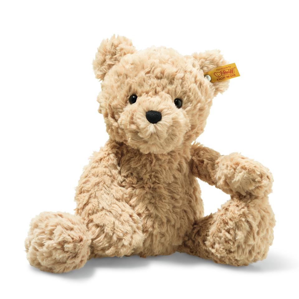 Soft beige baby teddy bear with Steiff button in ear