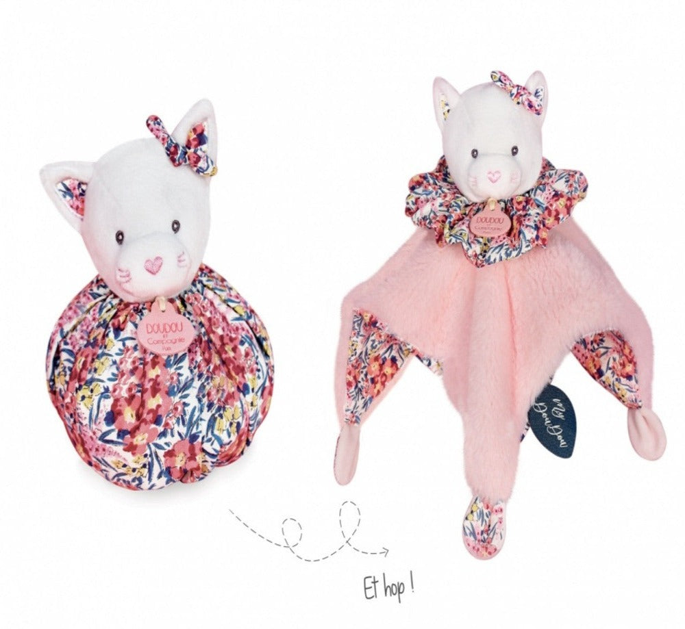 Soft pink baby comforter in pink velour lined with floral pattern, knot corners and a floral ruffle around the neck, white soft cat head, this transforms into a baby ball
