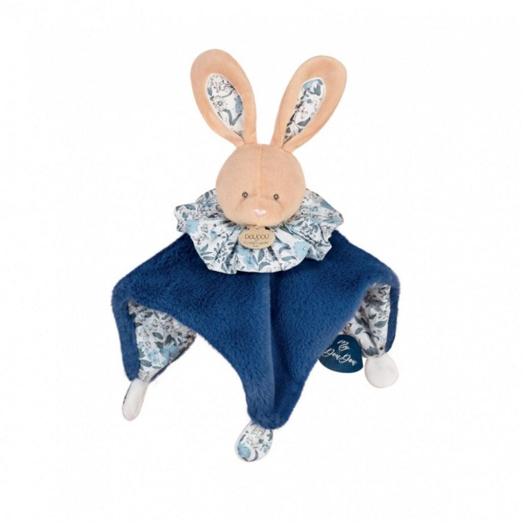 Baby comforter in soft blue velour with 4 knot corners, rabbits head with patterend ear and patterned ruffle around the neck, transforms into a ball with a rabbit head