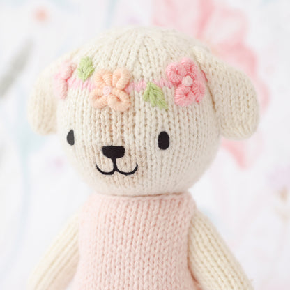 charlotte knitted dog with pink dress and flowers in hair 