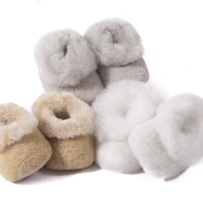 Alpaca and merino baby slippers in soft muted colours 