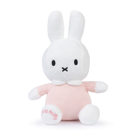 White miffy rabbit with pink outfit and my first miffy written on the foot