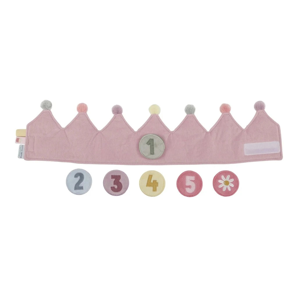 pink dressing up crown with pom poms and detachable numbers for specific birthdays