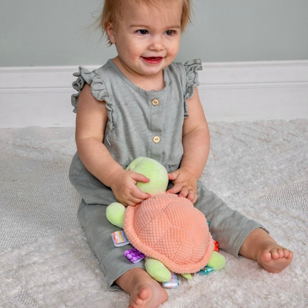 peach sensory turtle with taggies 