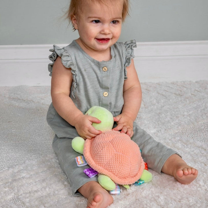 peach sensory turtle with taggies 