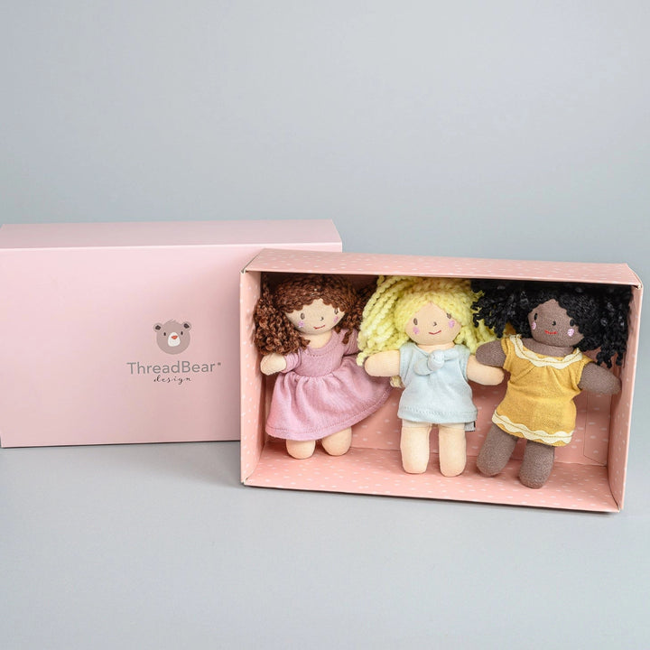 3 mini dolls in a box