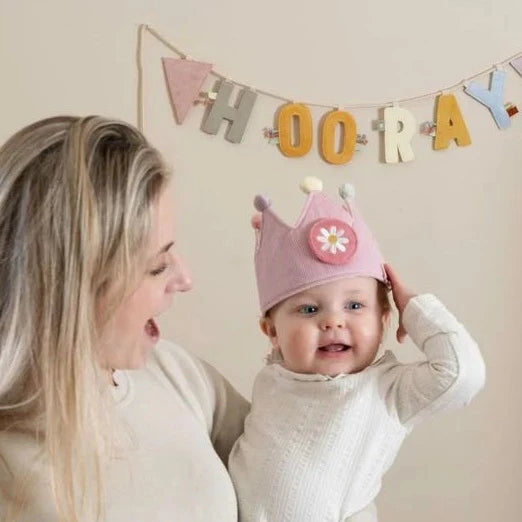 pink dressing up crown with pom poms and detachable numbers for specific birthdays