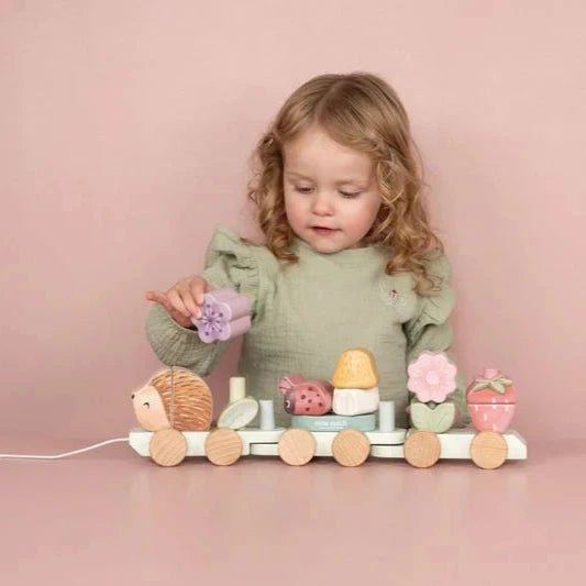 wooden pull along train stacking train with a hedgehog, flowers, ladybird, mushroom and strawberry