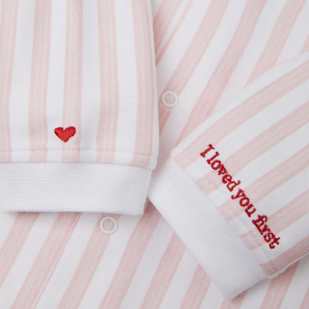 pink and white striped luxury baby sleepsuit with embroidered cuff 'I loved you first'